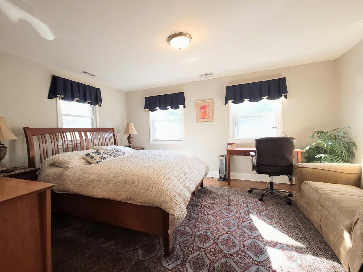 Master Bedroom with Desk and Sitting Area Master Bedroom with Desk and Sitting Area